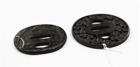 A 19th century Japanese tsuba and another